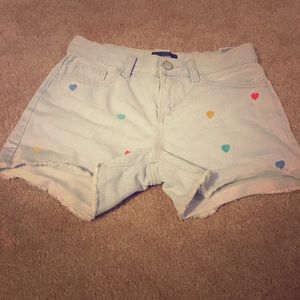 light blue jean shorts with hearts